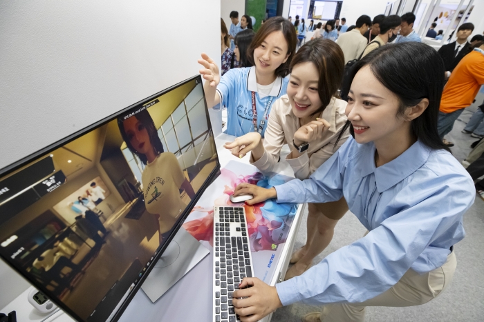 Models are demonstrating KT Corp.'s 3D showroom during a business trade show held at COEX in southern Seoul on Aug. 23, 2023 in this photo provided by the wireless carrie