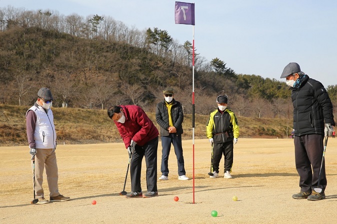 In this file photo provided by the Gyeongju City Government, seniors are seen playing golf at a park golf course.
