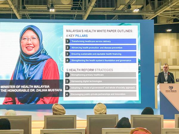 Farizal B Jaafar, Acting CEO of MHTC, presenting the welcoming remarks on behalf of Dr. Zaliha Mustafa, Honourable Minister of Health, Malaysia at Oman Health Exhibition and Conference 2023. 