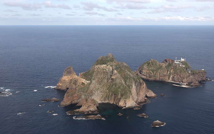 This aerial file photo, taken Sept. 2, 2021, shows South Korea's easternmost islets of Dokdo. (Pool photo) (Yonhap)