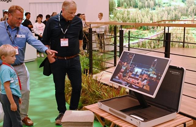 People are viewing LG Electronics Inc.'s portable display, StandbyME Go, at the International Consumer Electronics Fair in Berlin (IFA Berlin), Germany. The photo is provided by LG.